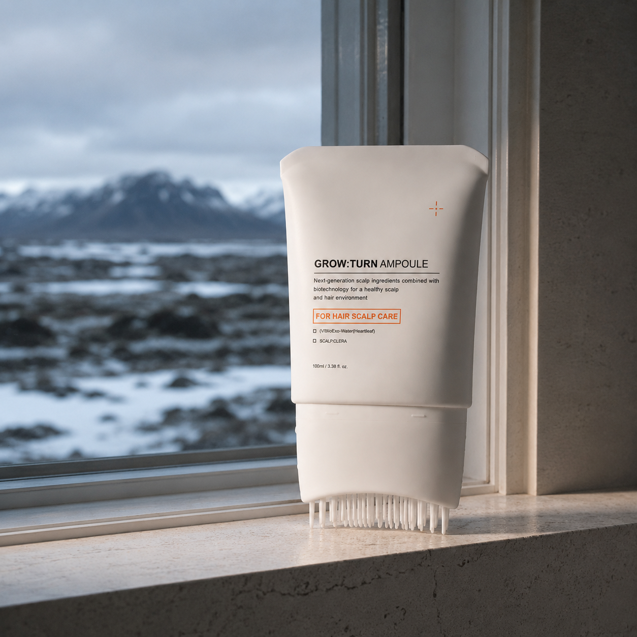 The ampoule on a windowsill against an Icelandic winter landscape